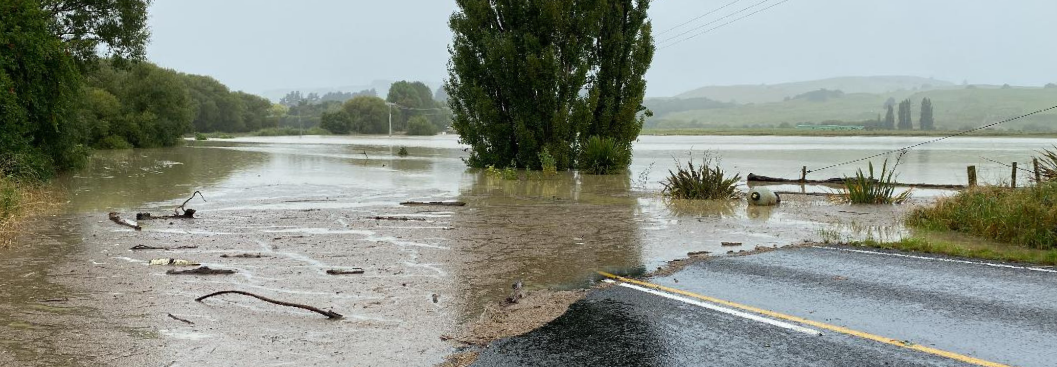 Flooding on a road and nearby land